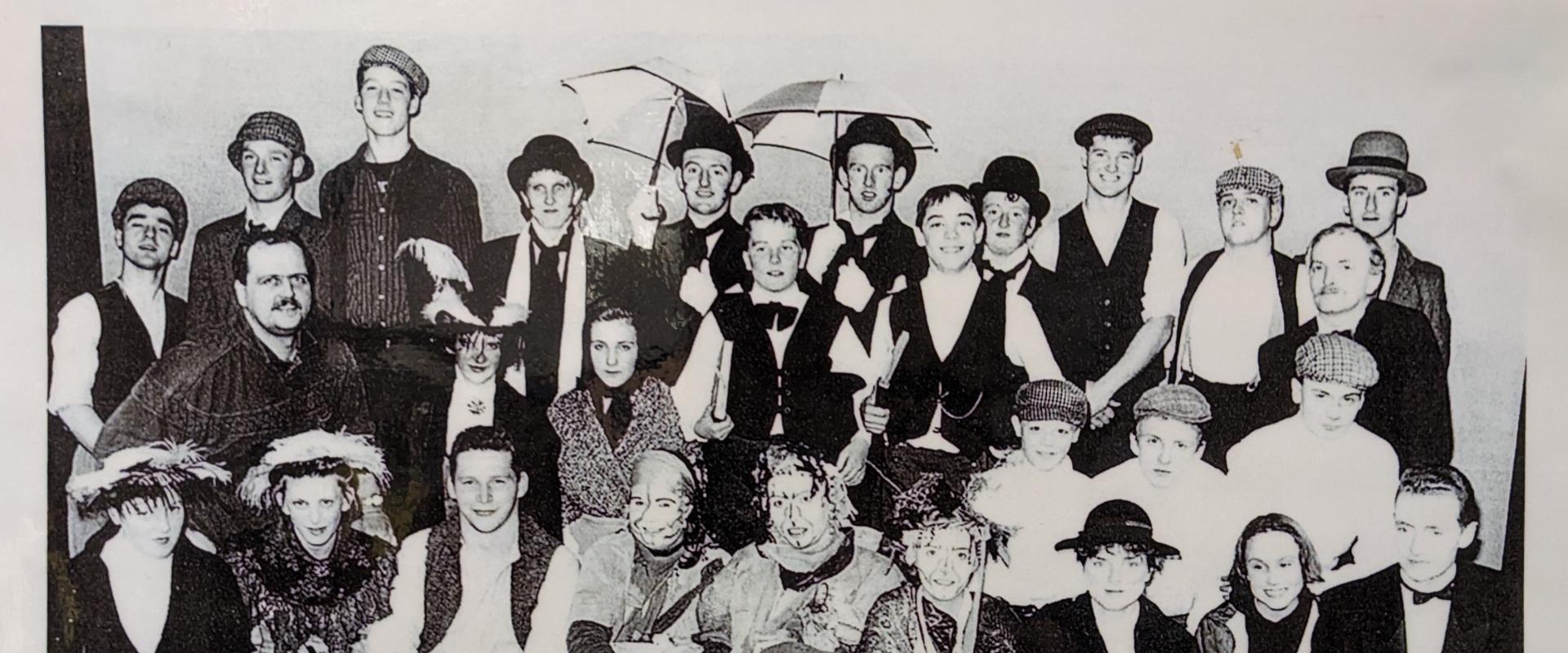 a black and white group photo of the team