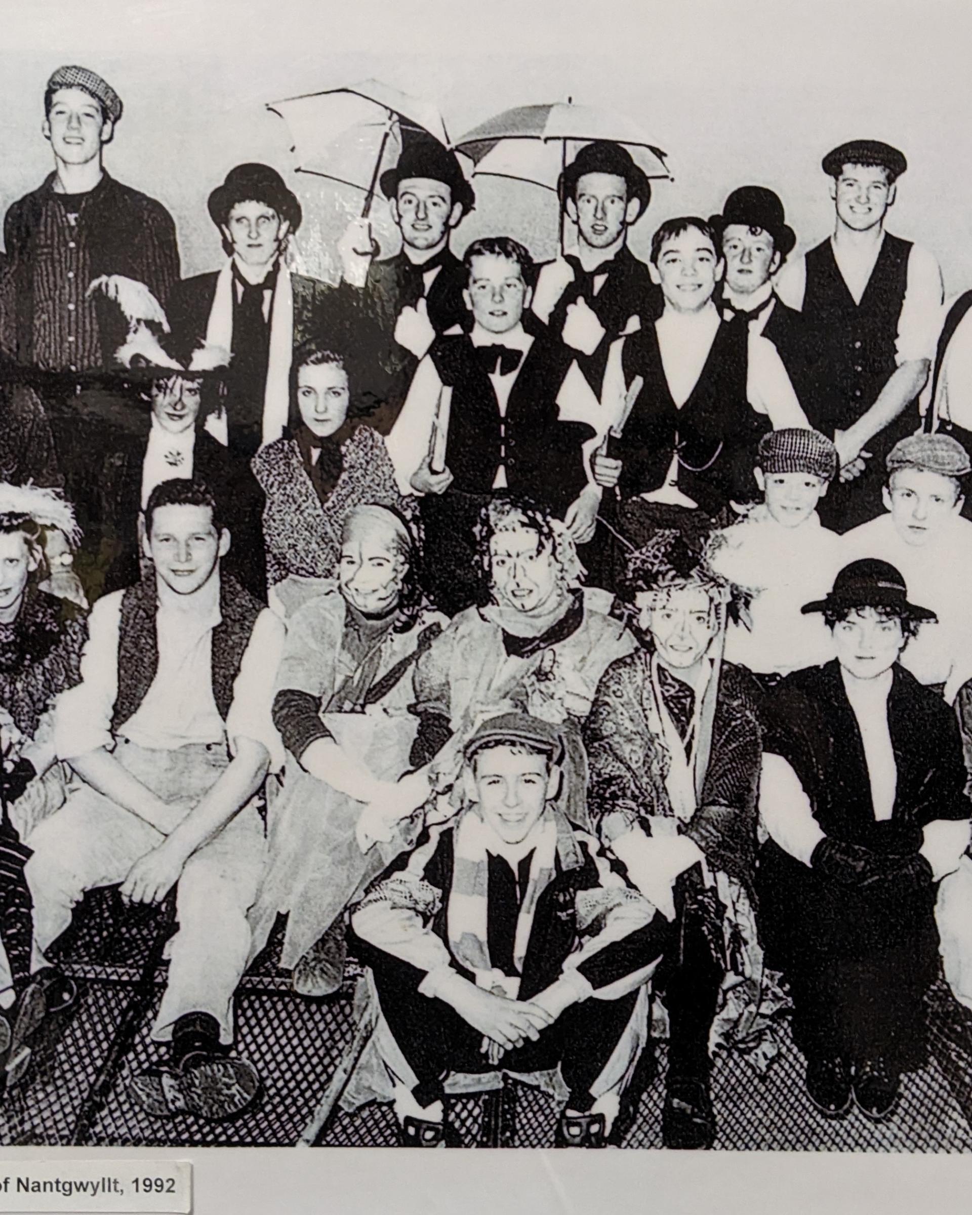 a black and white group photo of the team