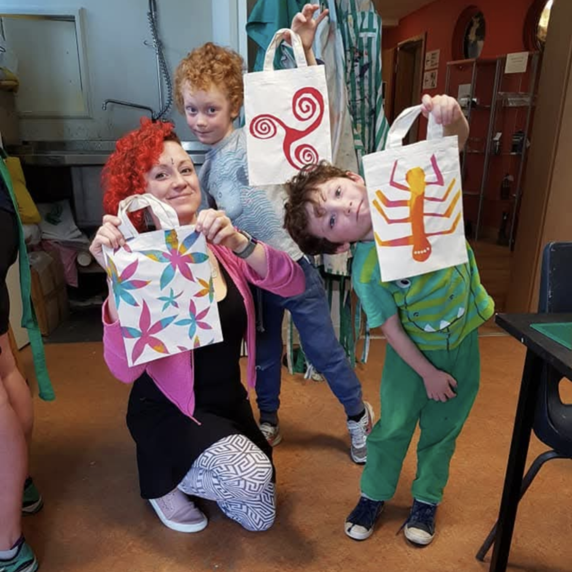 kids showing of art they've made